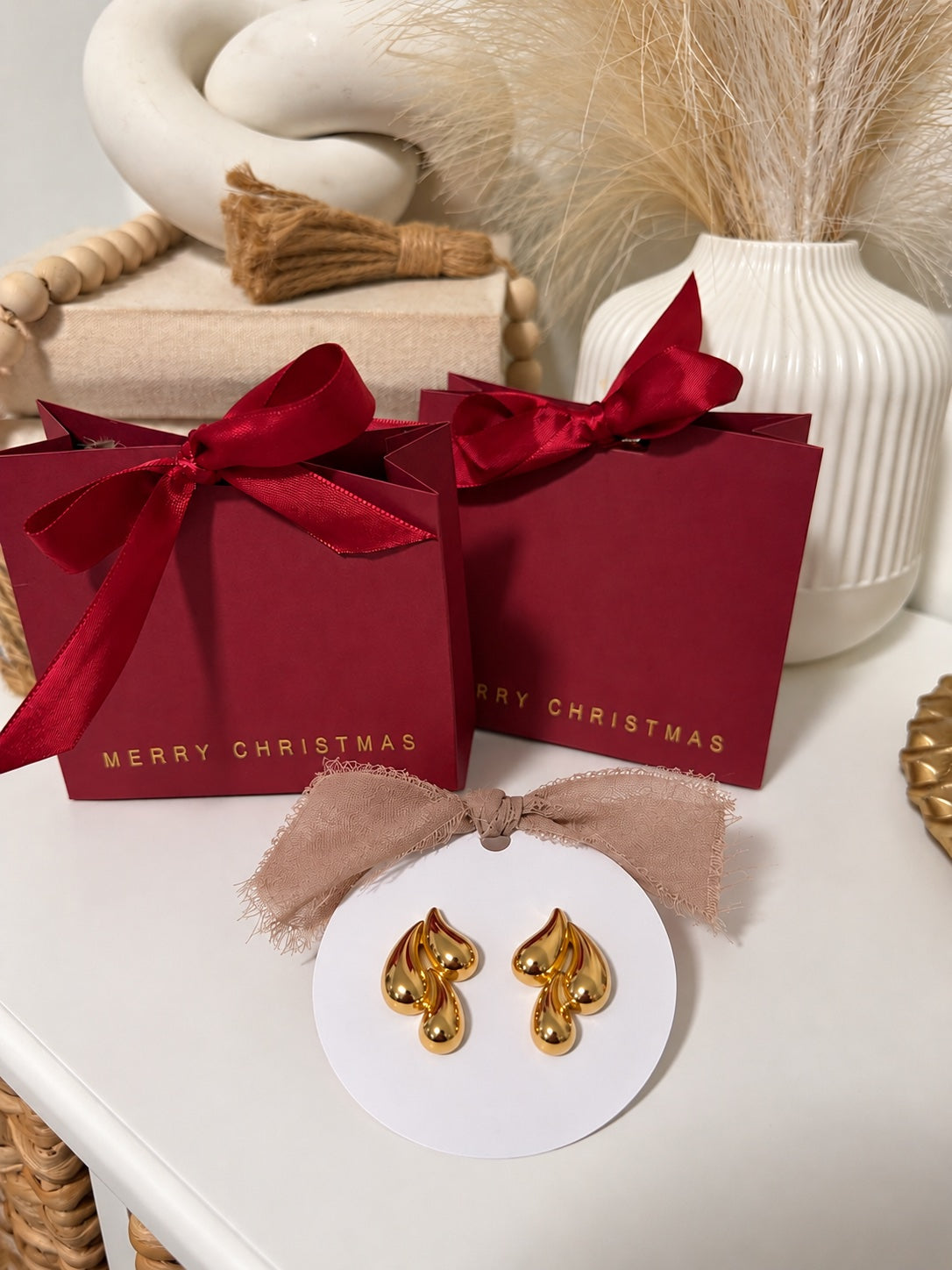 Pantallas lágrima oro con bolsita de regalo
